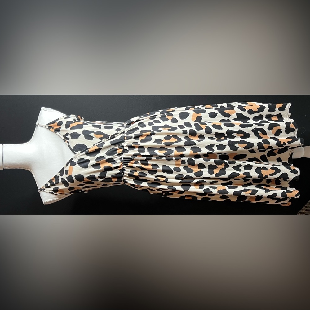 Leopard wrap chest adjustable dress. Like new. Medium